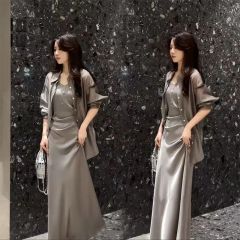 Fashionable and elegant women's two-piece suit for summer 2024, featuring a high-end split-back sun protection shirt and a popular strappy dress.