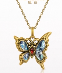 Ancient Babylonian streamer butterfly retro gold pendant at 30 degrees north latitude