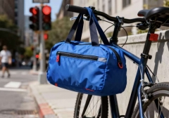 This vibrant blue sports bag boasts waterproof fabric, a roomy multi-pocket design, and padded adjustable straps.